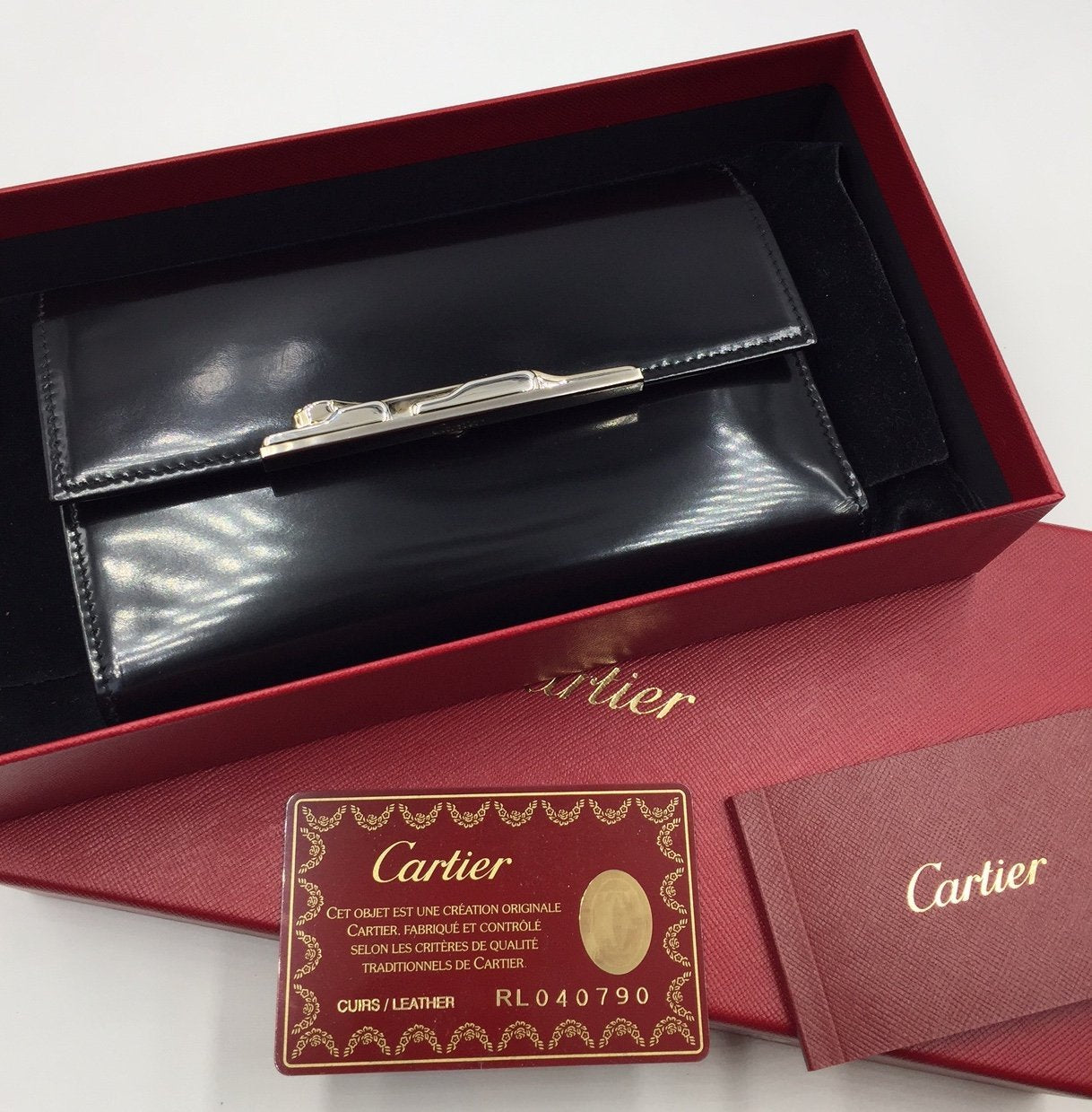 New Cartier Panther Wallet circa 2009 SOLD Deleuse Fine Jewelry